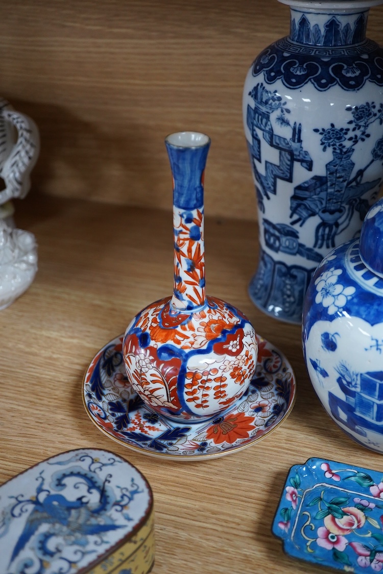 A pair of Chinese blue and white vases and covers and three other items, together with Japanese ceramics, cloisonné and Canton enamelware (11)